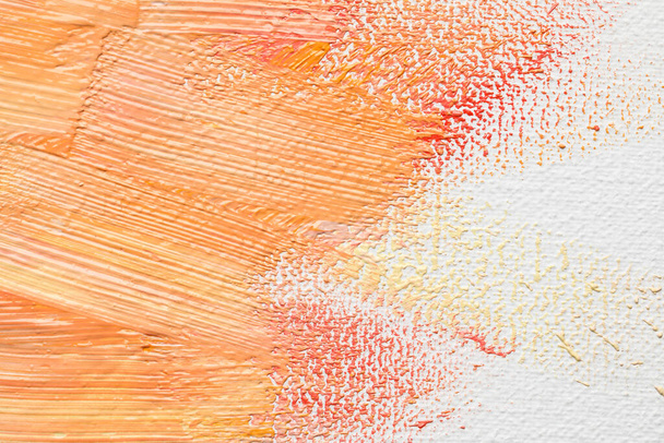 Beautiful strokes of colorful oil paints on white canvas, closeup - Φωτογραφία, εικόνα