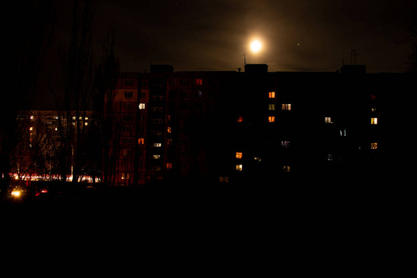 Ukraine Dnipro housing nail houses in the sleeping area of the city without electricity due to power outages in Ukraine due to missile attacks, war in Ukraine, people without electricity - Photo, Image