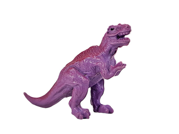 ティラノサウルス(T-rex)白い背景に隔離された子供用おもちゃのプラスチック恐竜の紫の色. - 写真・画像
