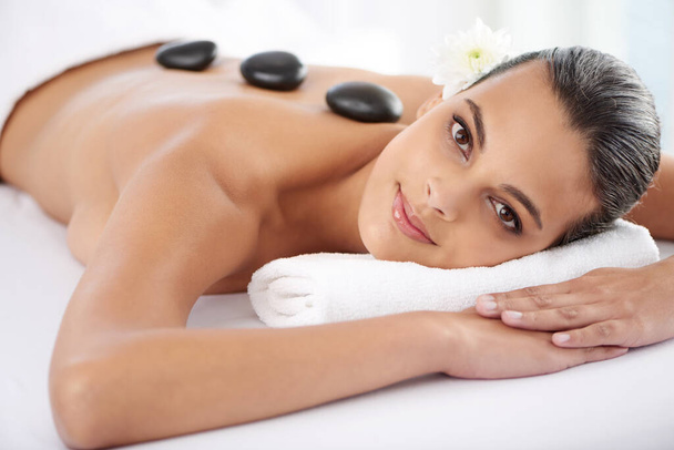 Relax, its the healthy choice. a beautiful young woman relaxing during spa treatment - Photo, Image