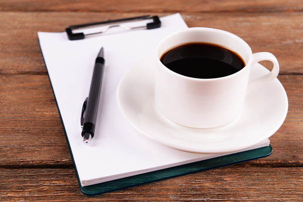 Coffee  with sheet of paper and pen - Φωτογραφία, εικόνα
