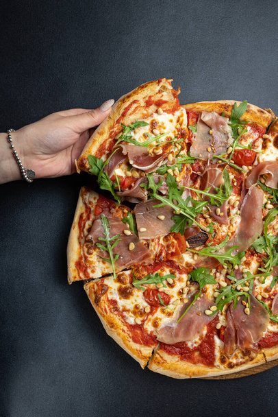 delicious pizza in an Italian restaurant - Foto, Bild