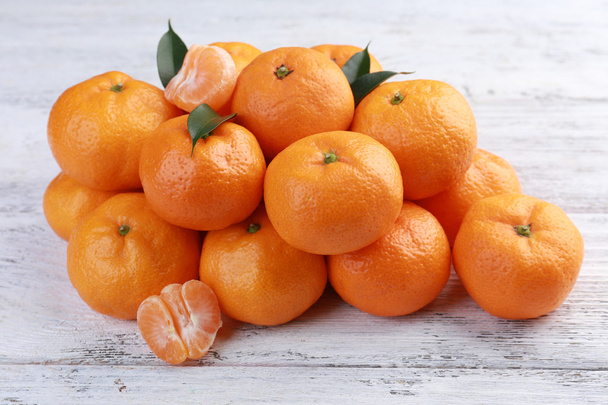 Tangerines on wooden background - Photo, Image