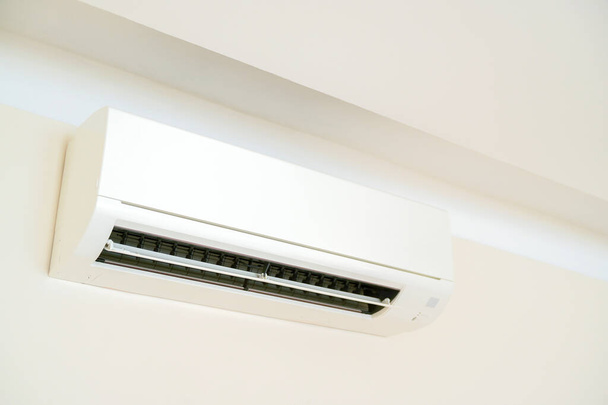 Air conditioner system on wall room - Фото, изображение