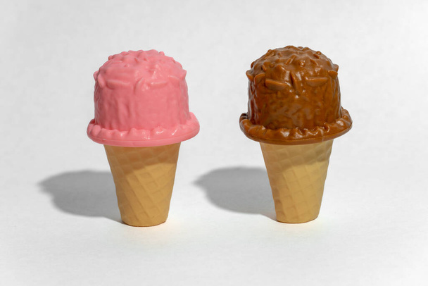 Two toy ice creams in a cone on white background - Photo, Image