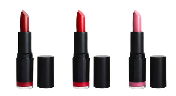Set with different beautiful lipsticks on white background - Foto, imagen