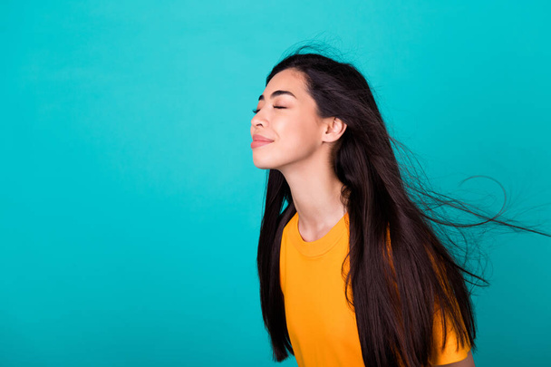 Profile photo of nice brunette lady feel air wear orange t-shirt isolated on teal color background. - Φωτογραφία, εικόνα