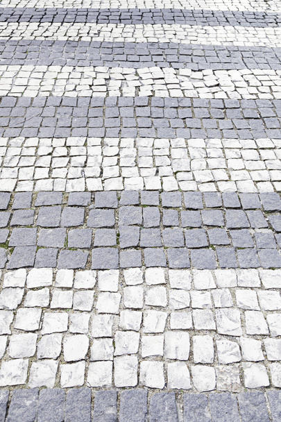 Типичный каменный пол Лиссабона
 - Фото, изображение