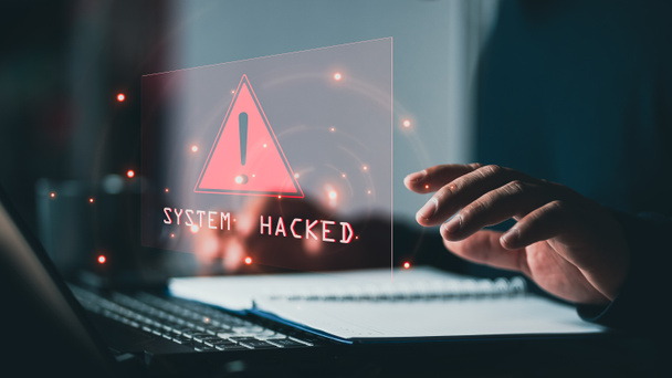 コンピュータネットワークへのサイバー攻撃の後、システムは警告をハッキングしました。情報概念が損なわれました。インターネット・ウイルスのサイバーセキュリティとサイバー犯罪。ハッカーが情報を盗むのはサイバー犯罪者で - 写真・画像