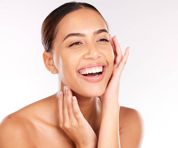 Beauty, skincare and face of happy woman on studio background with smile, glow and clean skin for cosmetic, makeup or dermatology result. Colombia aesthetic model excited about self care and wellness. - Фото, изображение