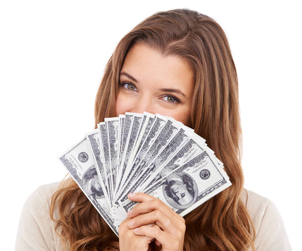 Ela é uma vencedora. Retrato de uma jovem atraente segurando notas de dólar na frente de seu rosto - Foto, Imagem