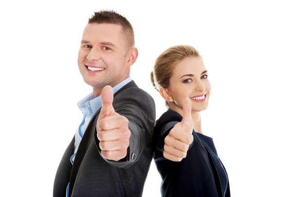 Business couple showing thumbs up - Foto, immagini