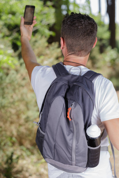 hiker taking a selfie in nature - Zdjęcie, obraz