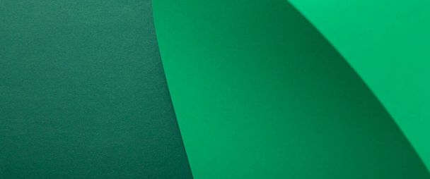 Design background curved background from green cardboard. Top view, flat lay. Banner. - Foto, afbeelding
