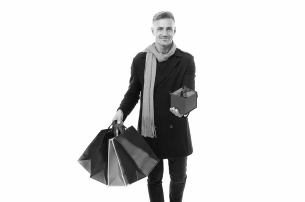 Shop more and more. Happy guy hold paperbags and present box. Gift shop. Black Friday sale. Shopping is fun. - Valokuva, kuva