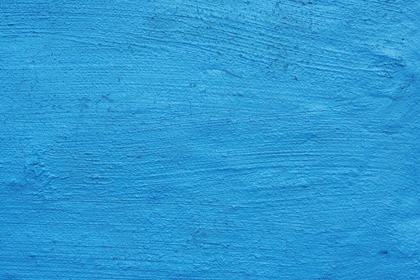 rough texture wall background painted bright blue - Photo, Image