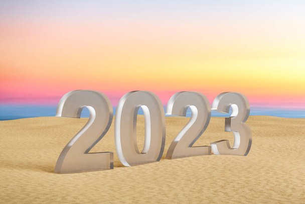 2023 glass number on sand sunset beach. Happy new year and holiday concept. - Foto, Bild