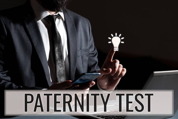Textové znamení ukazující test otcovství, obchodní vitrína test DNA určit, zda daný muž je biologický otec - Fotografie, Obrázek