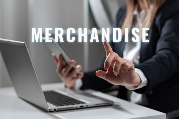 Szöveg megjelenítése Merchandise, Word for the goods that are bought and sold in business - Fotó, kép