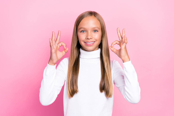 Photo of positive nice girl stylish white jumper two hand okey symbol satisfied good service job sale isolated on pink color background. - Zdjęcie, obraz