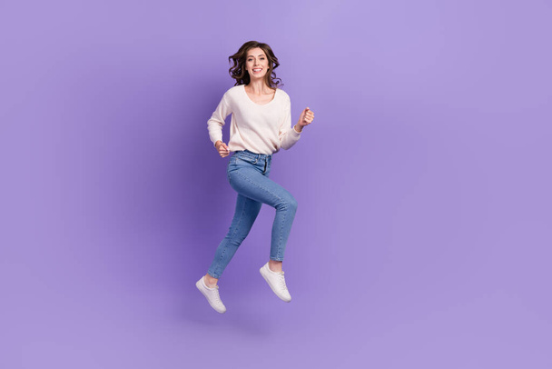 Full length photo of sportive positive lady running sport gym favorite time hobby move empty space isolated on purple color background. - Photo, Image
