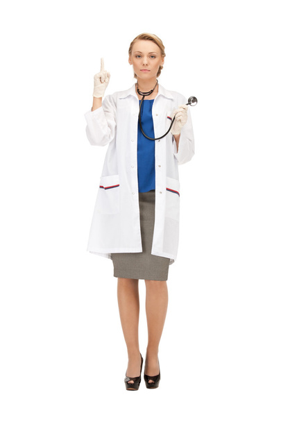 Attractive female doctor with stethoscope - 写真・画像