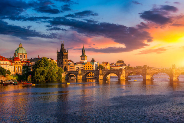 Old town of Prague. Czech Republic over river Vltava with Charles Bridge on skyline. Prague panorama landscape view with red roofs.  Prague view from Petrin Hill, Prague, Czechia. - Photo, Image