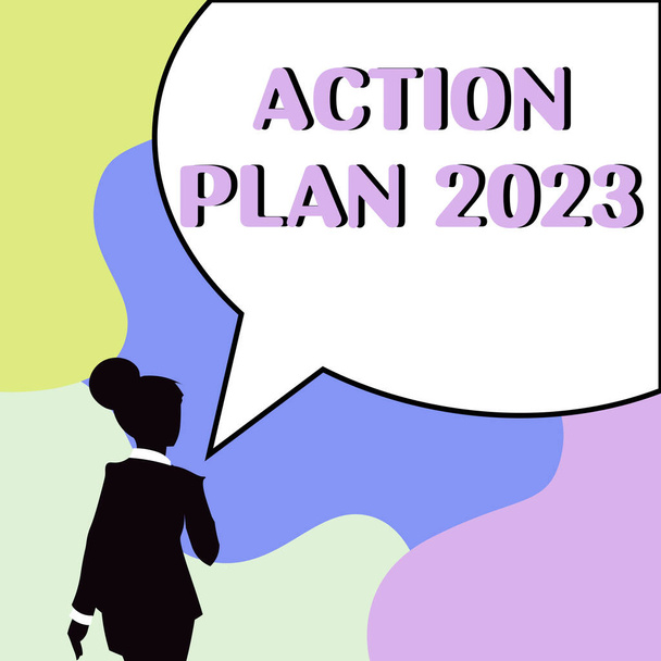 Señal de texto que muestra el Plan de Acción 2023, escaparate de negocios para hacer la lista contiene el número de cosas que se harán el próximo año - Foto, imagen