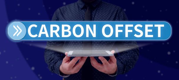 Käsitteellinen näyttö Carbon Offset, Word Written on Reduction of CO2 or other gas - Valokuva, kuva