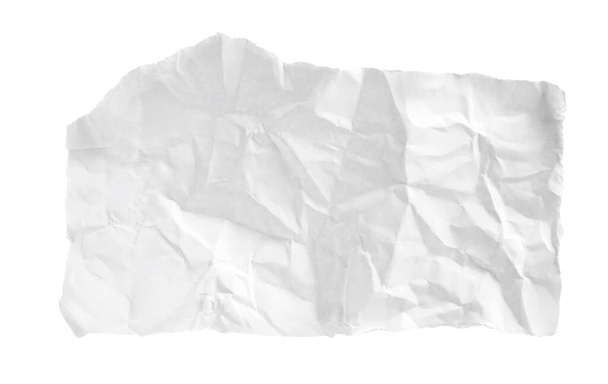 Kawałek pogniecionego papieru odizolowany na biało. Miejsce na tekst - Zdjęcie, obraz