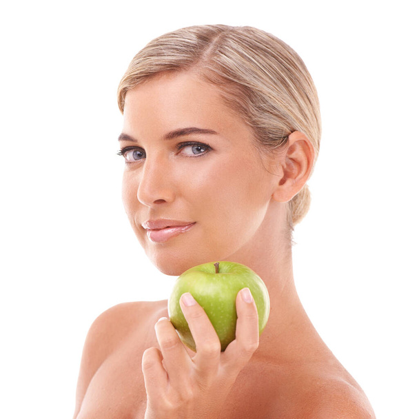 Ela tem sempre uma maçã por perto. Uma jovem mulher saudável com uma maçã - Foto, Imagem