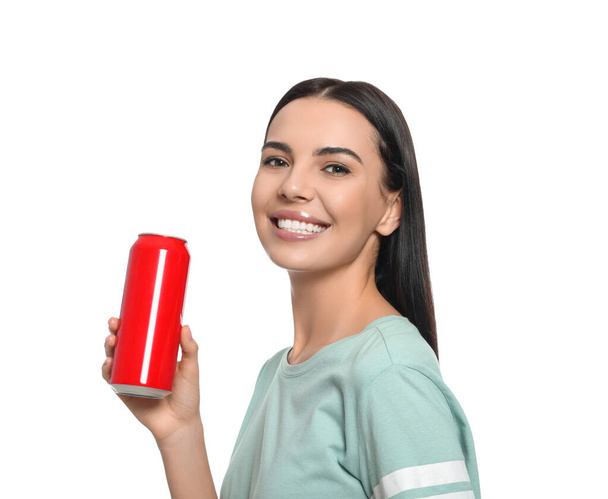 Beautiful happy woman holding red beverage can on white background - Photo, image