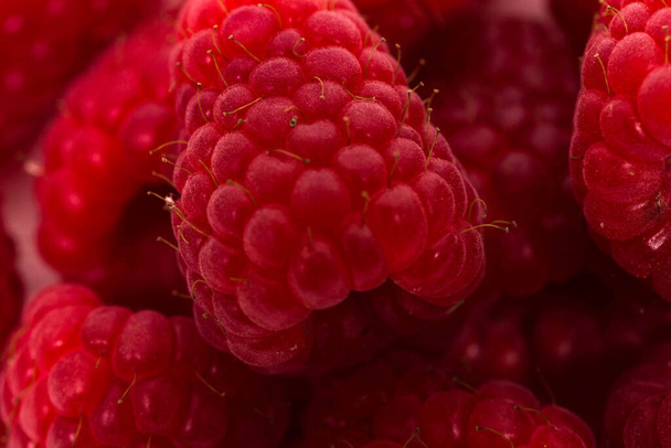 ripe red raspberry isolated on a white background - Fotografie, Obrázek