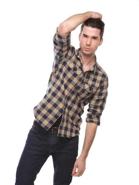Cool guy posing with hand in hair - Foto, imagen