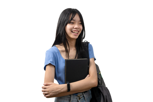 έφηβος κορίτσι φοιτητής ασιατικό βιβλίο κρατήσει σε λευκό φόντο.Πίσω στο σχολείο και την εκπαίδευση έννοια. - Φωτογραφία, εικόνα