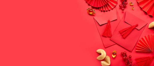 Envelopes with Chinese symbols on red background with space for text. New Year celebration - Foto, imagen