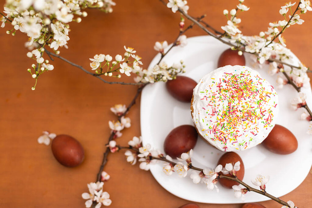 easter cake and red eggs on rustic wooden table. Top view - Fotoğraf, Görsel