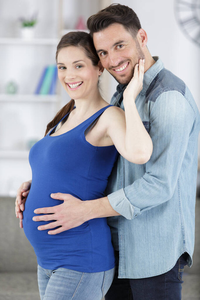 portrait of an expectant couple - Zdjęcie, obraz