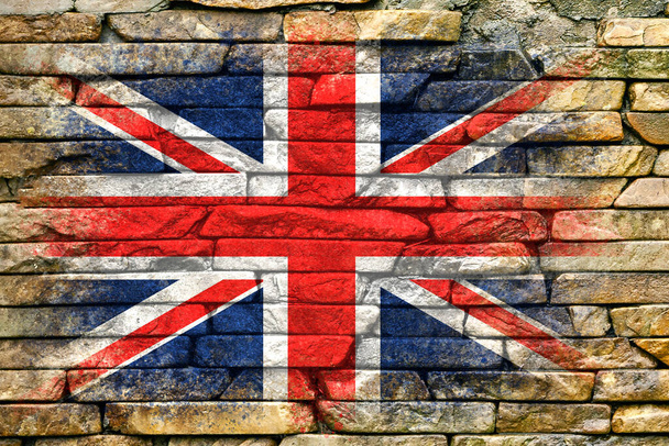 Флаг Британии. Флаг раскрашен на каменной стене. Каменный фон. Текстурированный творческий фон - Фото, изображение