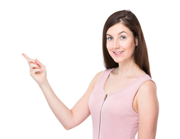 Woman with finger pointing up - Φωτογραφία, εικόνα