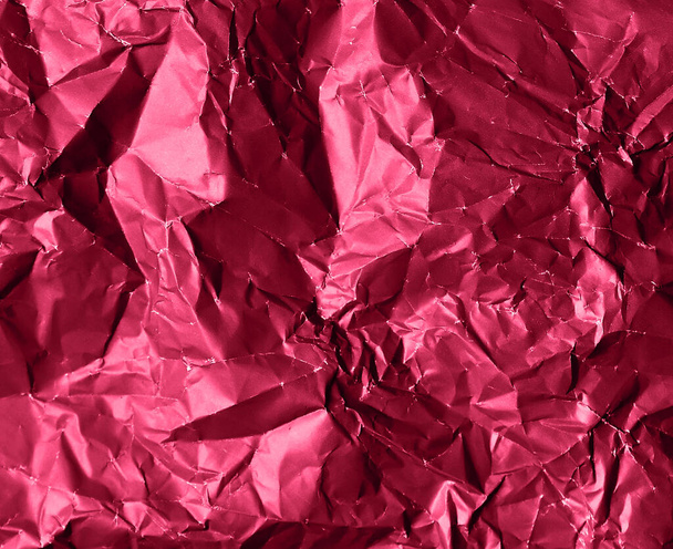 Photo of crumpled foil texture in trendy viva magenta color - Photo, Image