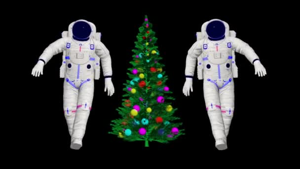 Due astronauti danzano con l'albero di Natale. Ballo di Natale nello spazio. Animazione 3D astronauti danzanti. - Filmati, video