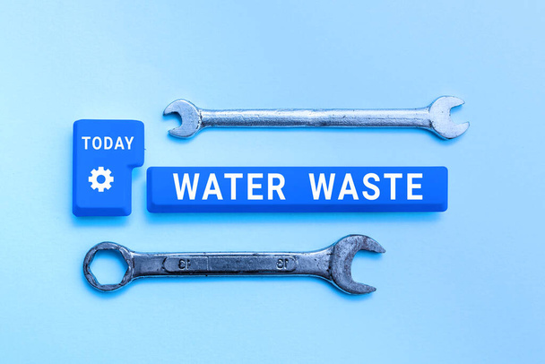 Texto que muestra inspiración Water Waste, Idea de negocio líquida que se ha utilizado como parte de un proceso industrial - Foto, Imagen