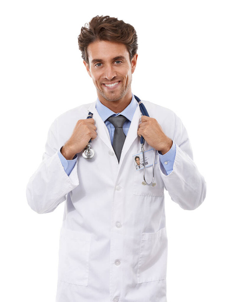 He inspires confidence. Studio portrait of a handsome young doctor isolated on white - 写真・画像