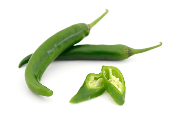 Fresh green chili peppers on a white background - Photo, Image