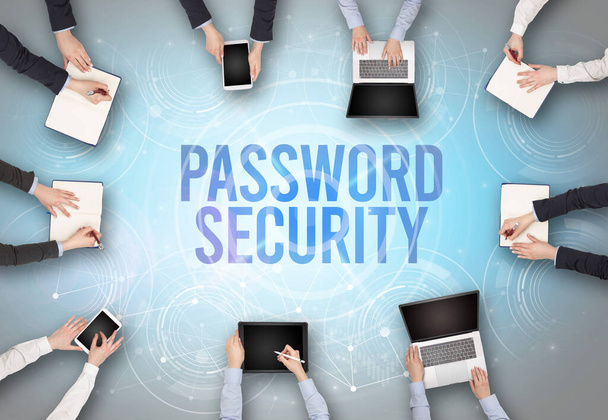 Group of people in front of a laptop with PASSWORD SECURITY insciption, web security concept - Photo, Image