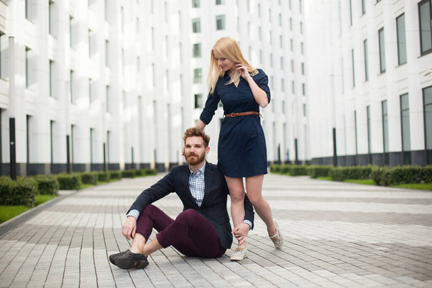 Young couple man and woman on background of office building - Photo, Image