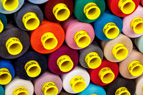 set of multi-colored spools of thread for sewing close-up - Photo, Image