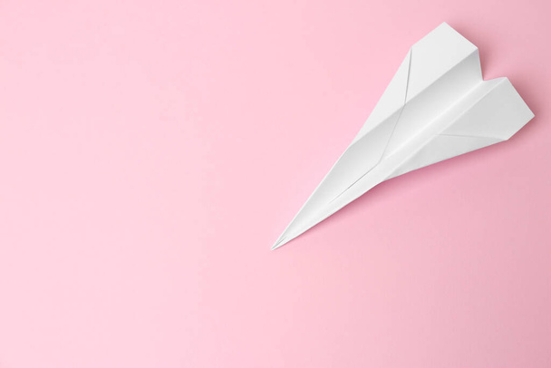 Handmade paper plane on pink background, top view. Space for text - Φωτογραφία, εικόνα