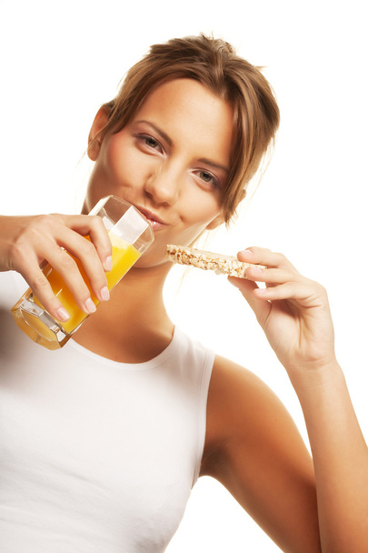 woman sipping orange juice - Foto, Imagem